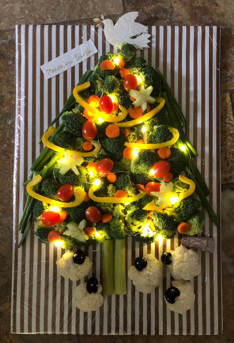 Light up your veggie tray.  String the lights throughout the broccoli Christmas tree.