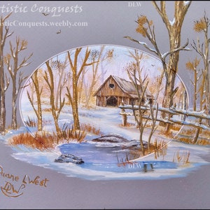 May include: A painting of a winter scene with a wooden cabin in the background, a small stream in the foreground, and trees covered in snow. The painting is framed in an oval shape and has the artist's signature, "Duane West", in the bottom left corner.