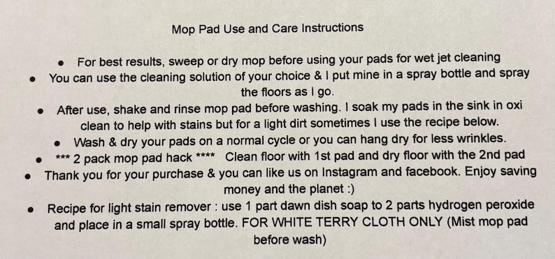 May include: A white sheet of paper with black text outlining instructions for using and caring for mop pads. The text includes tips for cleaning, washing, and drying the pads, as well as a recipe for a light stain remover.