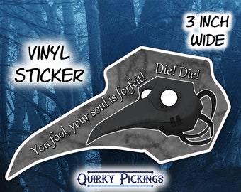 May include: A vinyl sticker with a black plague doctor mask design and the text "You fool, your soul is forfeit! Die! Die!". The sticker is 7.6 cm wide and has a gray and white design. The brand name "Quirky Pickings" is at the bottom.