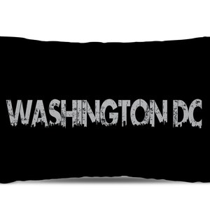 May include: Black pillow with the text "WASHINGTON DC" in a gray, distressed font.