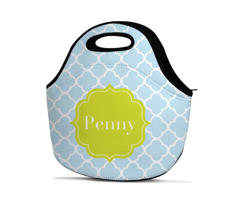 May include: A light blue lunch bag with a white geometric pattern. The bag has a black handle and a lime green label with the name "Penny" in white text.