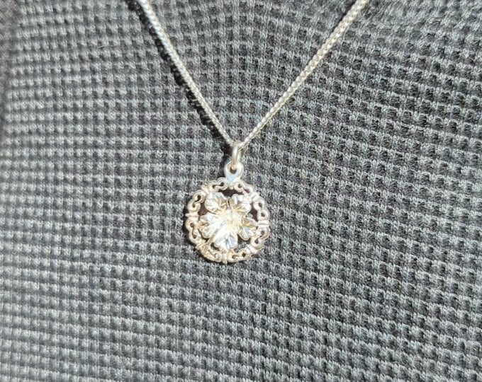 Sterling Silver Hibiscus Flower Pendant: Ornate Circle Charm Necklace