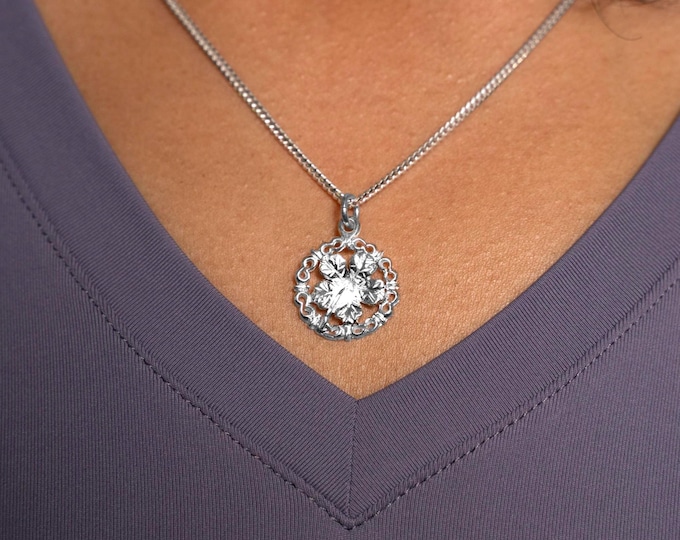 Sterling Silver Hibiscus Flower Pendant: Ornate Circle Charm Necklace