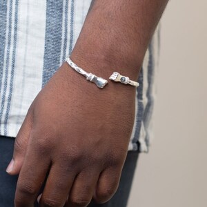 150 West Indian Bangle with Fists Handmade in Sterling Silver .925