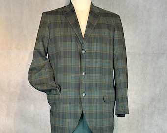 May include: A green and brown plaid blazer with a three-button closure.