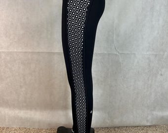 Leggings de yoga sexys de Lululemon con tiras laterales de esmoquin cortadas con láser, color negro y talla 4