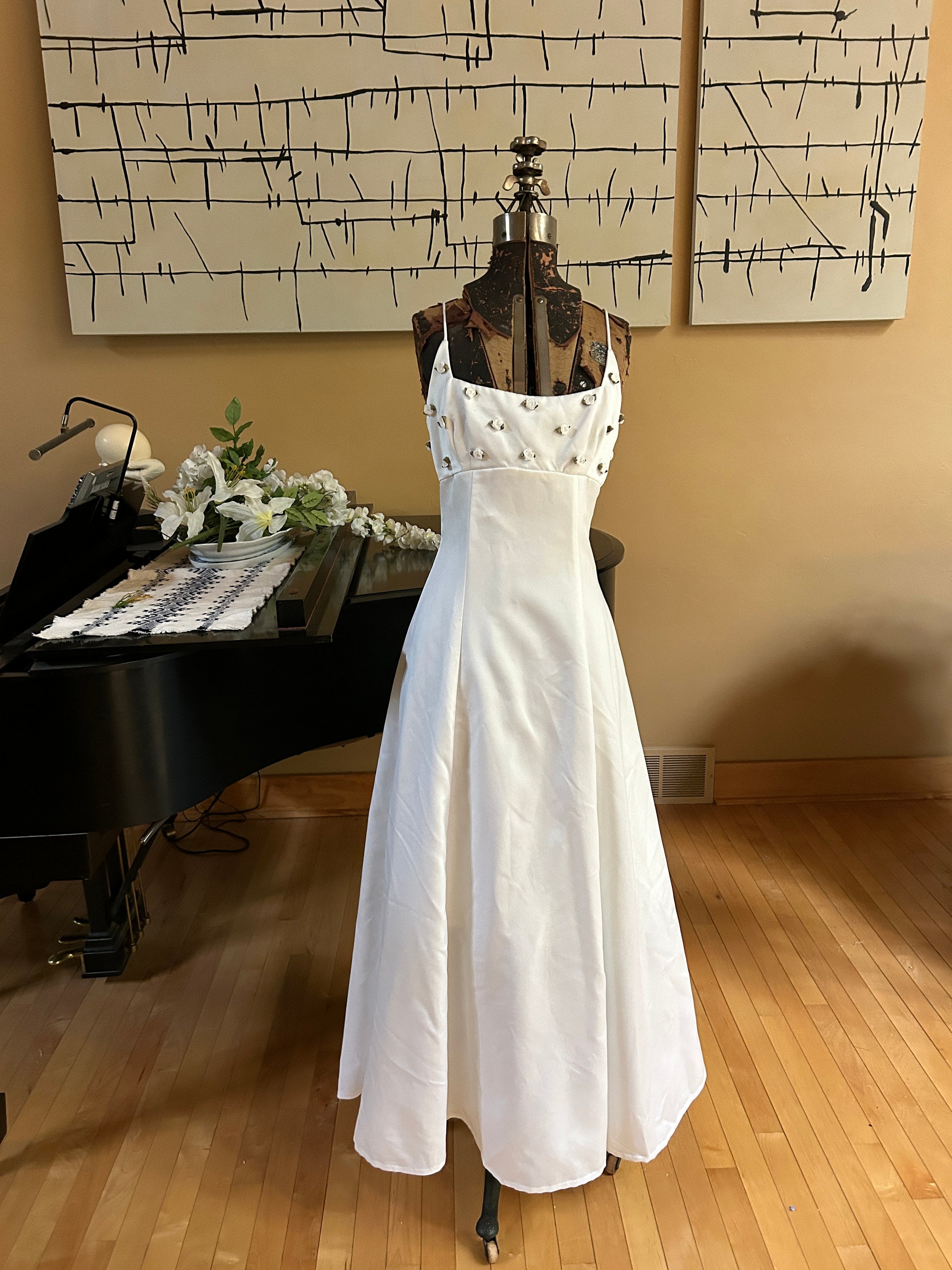 Lord and taylor js collection conical dresses