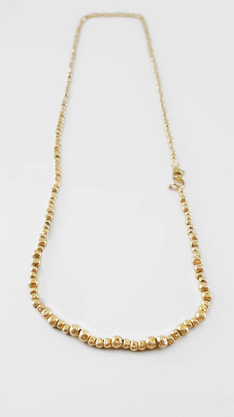 14K Gold filled Gold beaded long necklace Gold stackable bracelets Statement gold bracelets Gold bohemian bracelet Gold beaded bracelet