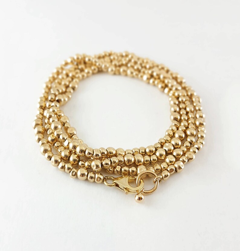 14K Gold filled Gold beaded long necklace Gold stackable bracelets Statement gold bracelets Gold bohemian bracelet Gold beaded bracelet