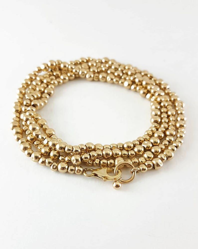 14K Gold filled Gold beaded long necklace Gold stackable bracelets Statement gold bracelets Gold bohemian bracelet Gold beaded bracelet