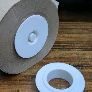 Adaptador de papel toalha Tork H80 para rolo de papel toalha Costco Marathon.