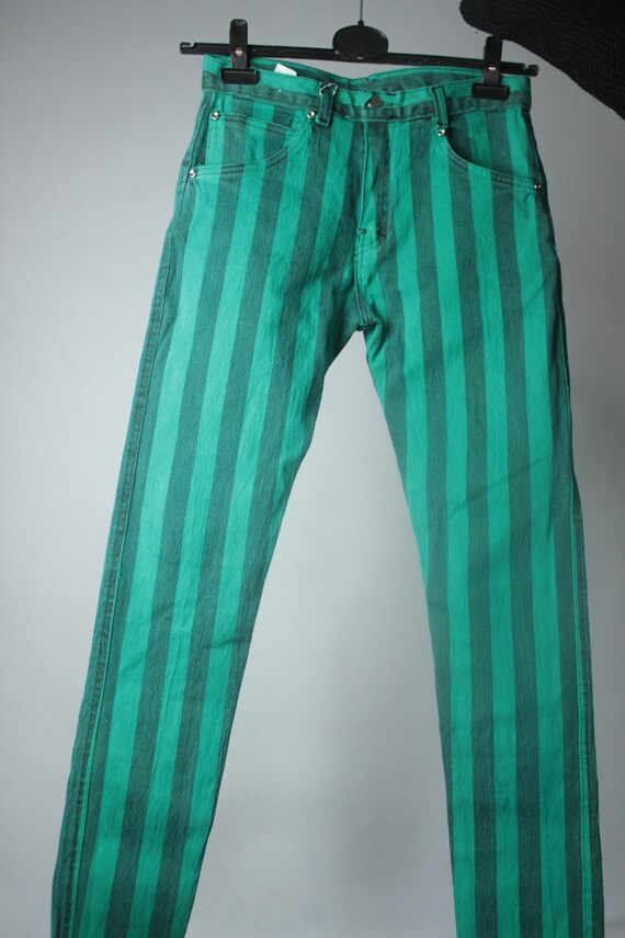 green and black striped trousers