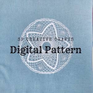 May include: A white crocheted doily with a star design on a blue background. The text "SP CREATIVE CRAFTS Digital Pattern" is printed below the doily.