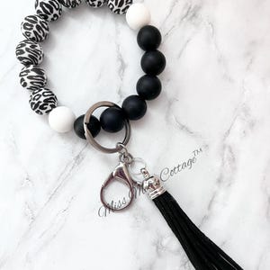 Pulsera/pulsera/borla/con cuentas/pulsera elástica con estampado de leopardo de las nieves, ideal para profesores, amigos, mamás, cumpleaños, día de la madre y regalos.