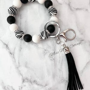 Pulsera/pulsera/borla/con cuentas/pulsera elástica de silicona con estampado de cebra para maestras, amigas, mamás, cumpleaños, día de la madre, regalo.