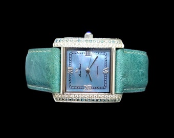 Montre suisse Lucien Piccard, saphir bleu et diamants blancs, modèle 26000