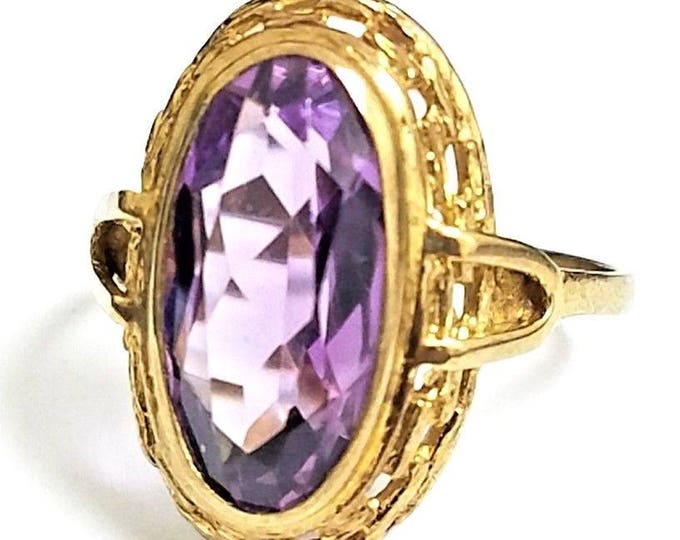 Victorian Era 8 Karat Yellow Gold 4.50 Carat Oval Amethyst Cocktail Ring