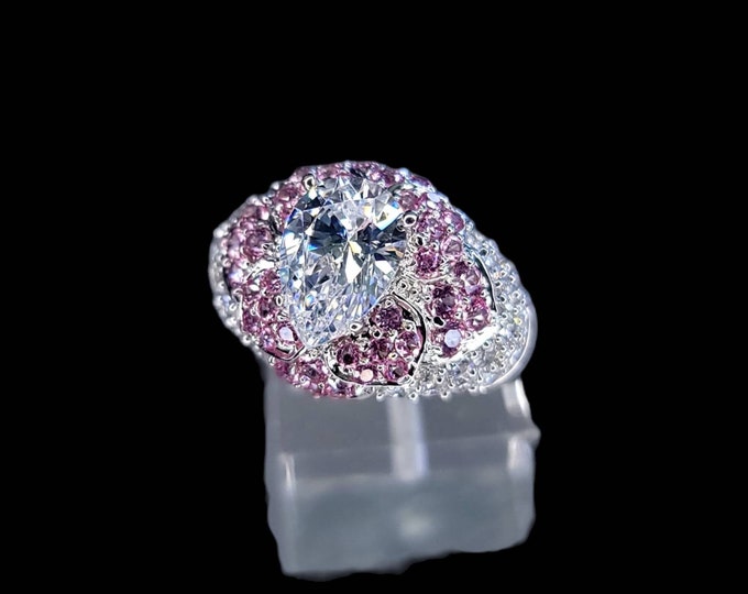 Rhodium-Plated 925 Sterling Silver Pear Cut 3.00 CTW Cubic Zirconia & Pink Topaz Ring.