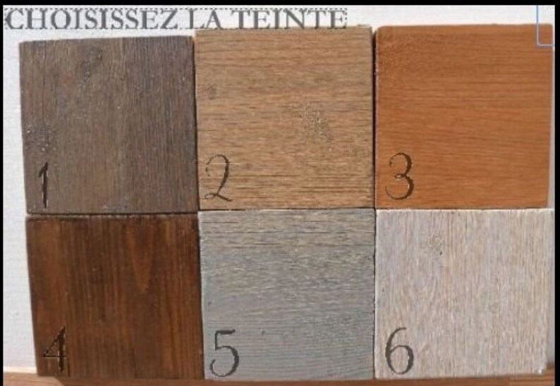 May include: Six wood samples with different stains, numbered 1 through 6.  The samples are arranged in two rows of three.  The top row shows a light brown stain, a medium brown stain, and a reddish brown stain. The bottom row shows a dark brown stain, a gray stain, and a white stain.
