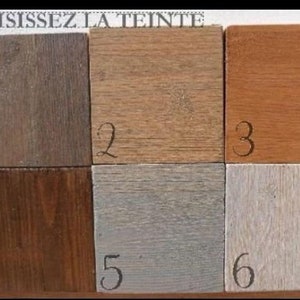 May include: Six wood samples with different stains. The samples are numbered 1 through 6. The text "CHOISISSEZ LA TEINTE" is at the top of the image.