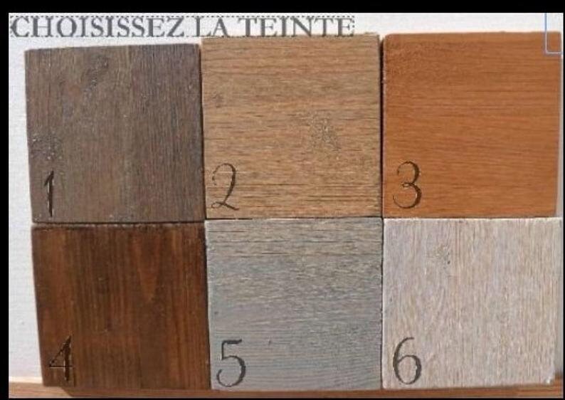 May include: Six wood samples with different stains. The samples are numbered 1 through 6. The text "CHOISISSEZ LA TEINTE" is at the top of the image.