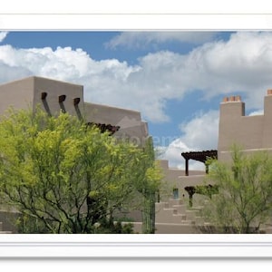 May include: A view of a desert-style home with a stucco exterior and a terracotta roof. The home has a large, open patio with a view of the surrounding desert landscape.