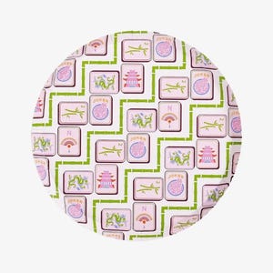 May include: A round, white tray with a repeating pattern of pink Mahjong tiles, green bamboo-like lines, and various symbols. The tiles feature dragons, pagodas, fans, and the word "Joker".