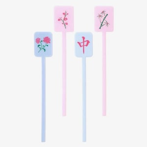 May include: Four decorative cocktail picks. Two are light pink and two are light blue. Each pick has a rectangular top with a different design: flowers, bamboo, and a Chinese character. The picks are for serving appetizers.