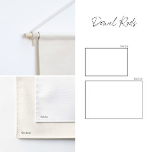 Op de afbeelding: Twee witte canvas panelen met deuvels en ophangkoorden. De panelen zijn gelabeld met "Wit" en "Neutraal". De tekst "Dowel Rods" is in cursief geschreven boven twee rechthoeken met de labels "19x29" en "26x39".