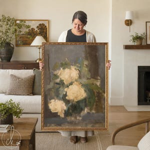 May include: A rectangular wall art piece featuring an impressionistic oil painting of pale yellow flowers against a dark, moody background. The artwork is encased in an ornate, textured gold frame with intricate detailing along the edges.