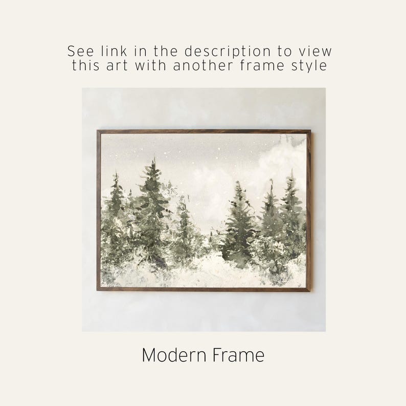 May include: A rectangular wall art print in a dark wood modern frame featuring a watercolor landscape of evergreen trees in shades of green and grey against a light background. Text above reads: See link in the description to view this art with another frame style. Text below reads: Modern Frame.
