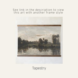May include: A landscape tapestry featuring a serene river scene with trees and a cloudy sky. The artwork is displayed with wooden hanging rods at the top and bottom. Text on the image reads: "See link in the description to view this art with another frame style" and "Tapestry".