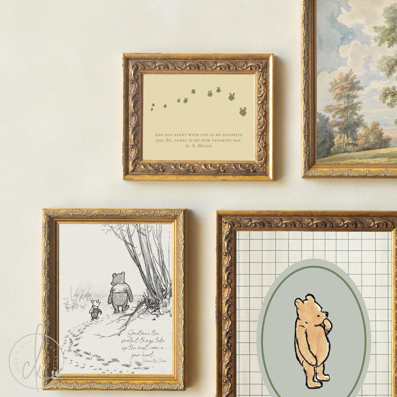 May include: Four framed artworks with gold ornate frames. One features a quote with bunny illustrations, another a sketch of Winnie the Pooh and Piglet, and a third with a Winnie the Pooh illustration. The fourth is a landscape painting.