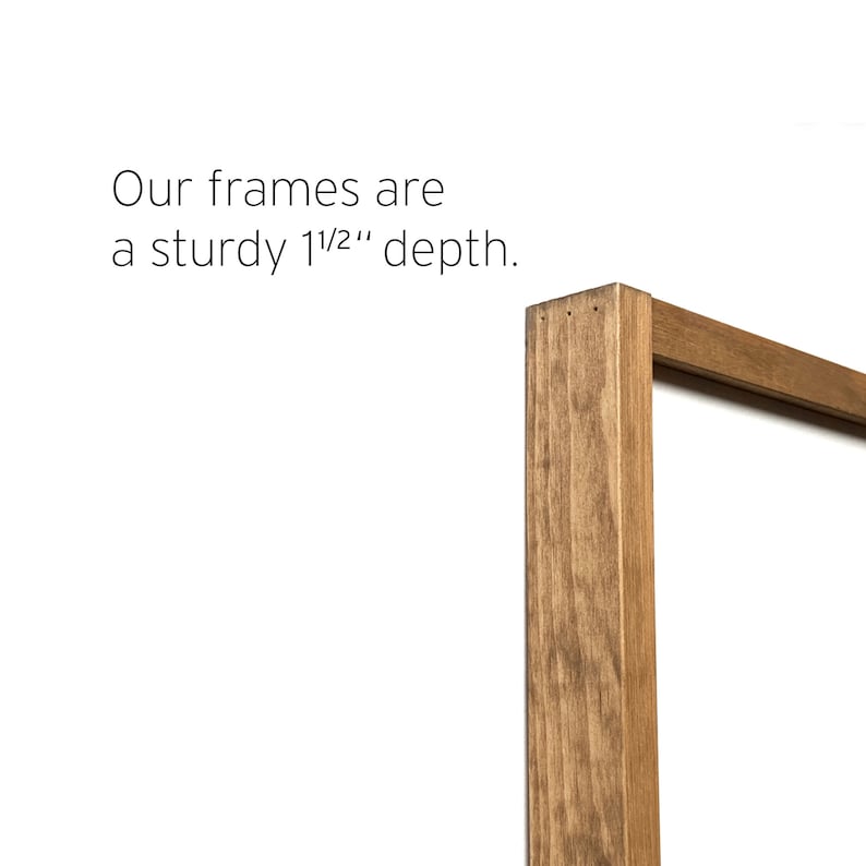 May include: Close-up of a wooden picture frame corner. The frame is a warm brown color and has a sturdy 1 1/2 inch depth. The text "Our frames are a sturdy 1 1/2" depth" is visible.