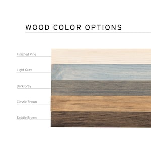 Wood color options chart showing five frame stains: Finished Pine, Light Gray, Dark Gray, Classic Brown, and Saddle Brown.