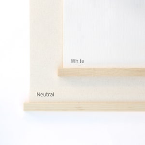 Canvas background color chart showing two options: White and Neutral, each with a natural wood frame bottom edge.