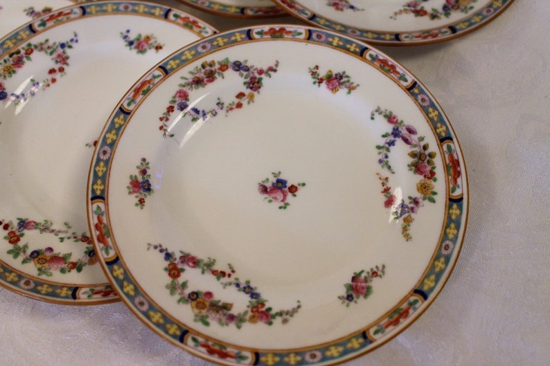 Set of 12 Antique Minton Fine China 6.25 Bread or Dessert Plates Bright Spring Floral Swags with Yellow Rim B806 Circa 1905