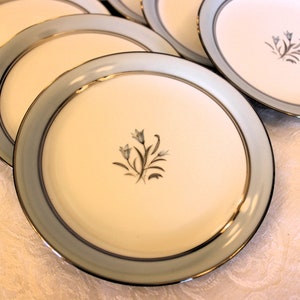 Set of 12 Noritake China 6.25&quot; Bread Plates - Bluebell 5558 Pattern, Blue Floral Center, Pastel Blue and Platinum Rim, Excellent Condition