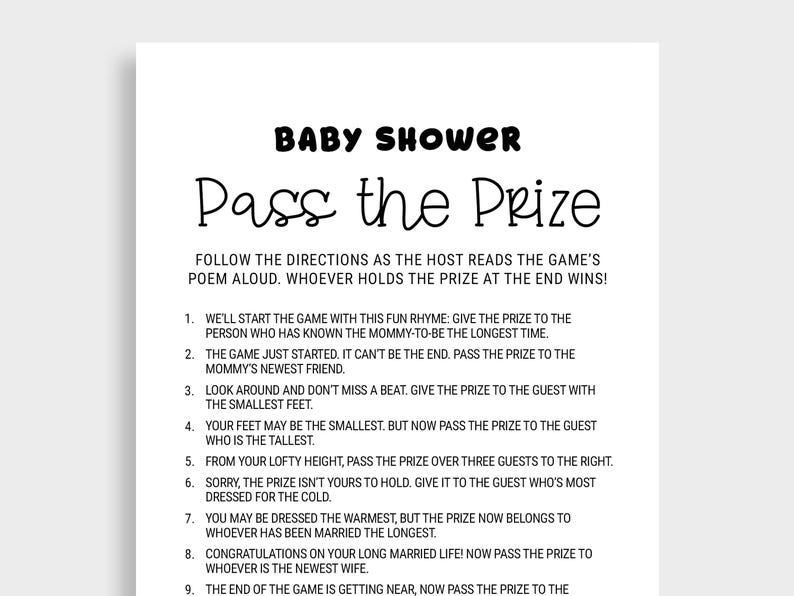 May include: A white paper with black text that reads "Baby Shower Pass the Prize." The text includes instructions for a baby shower game. The game involves passing a prize based on various criteria.