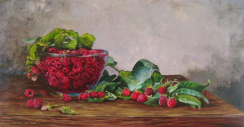 May include: An oil painting of a clear glass bowl filled with bright red raspberries and green leaves. Several loose raspberries and leafy stems are scattered on the dark wooden surface next to the bowl, set against a neutral gray background.