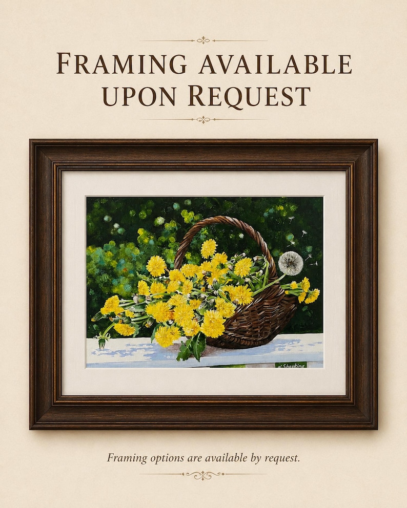 May include: Framed artwork featuring a woven basket overflowing with bright yellow dandelions. The painting is set against a green background and a white fence. The artwork is framed in a dark brown wooden frame.