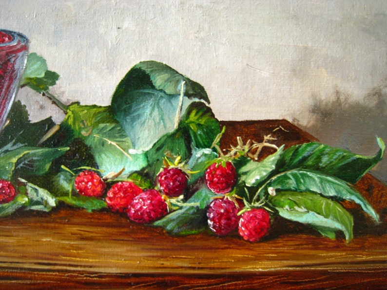 May include: An oil painting depicting a cluster of bright red raspberries with green leaves resting on a wooden surface. A portion of a clear glass bowl filled with more raspberries is visible on the left side of the composition.