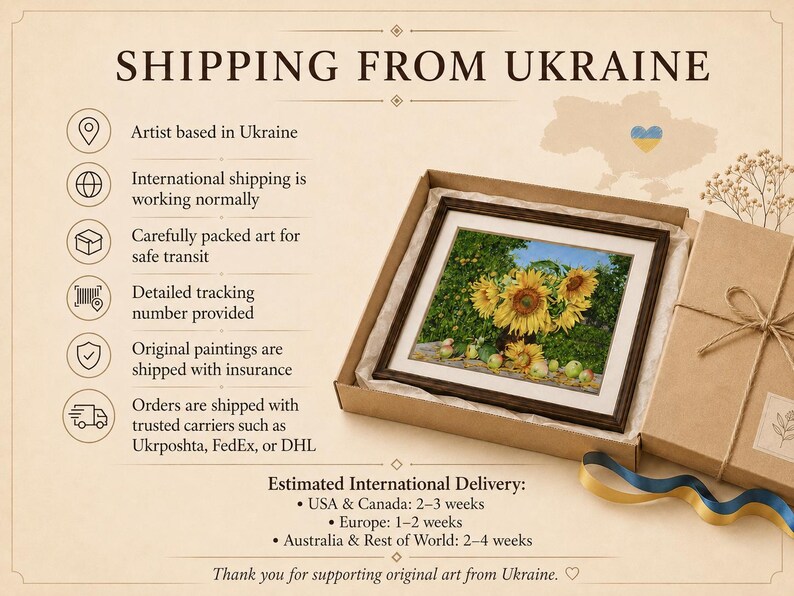 May include: A framed painting of yellow sunflowers and green apples in a brown cardboard gift box with a tan lid and a blue and yellow ribbon. The painting features a vibrant floral arrangement against a green background with scattered fruit.