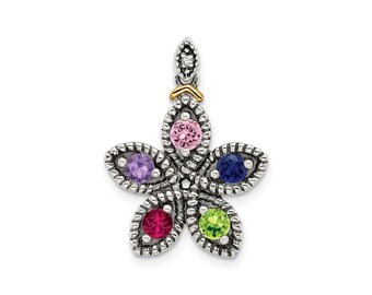 May include: Silver pendant with a flower design featuring five colourful gemstones: pink, purple, blue, red, and green. The pendant has a gold accent at the top.