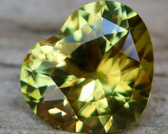 A beautiful 1.40 carat natural chrysoberyl from Ceylon, Sri Lanka, expertly faceted into a romantic heart shape