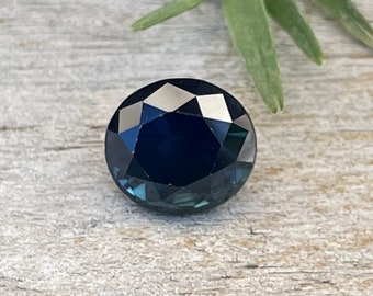 Natural Deep Blue Green Sapphire | 1.71 Carat | Oval Cut | 6.91x6.38 mm | Peacock Sapphire