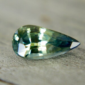 Natural Pear Cut Parti Sapphire: 1.12 Carat Bi-Color Gemstone