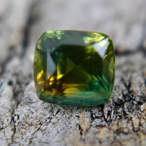 Natural Bi-Color Sapphire: 4.03 Carat Cushion Cut Gemstone