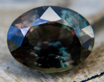 Natural Greenish Brown Sapphire | Oval Cut | 2.07 Carat | 8.57x6.66 mm | Loose  Gemstone For A Beautiful Jewellery Making | Sapphire Stone